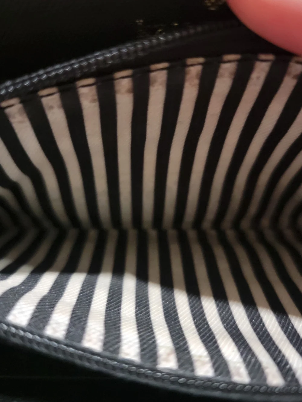 kate spade black zip-around Saffiano leather wallet with gold logo